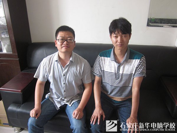 万勇老师和刘双成同学合影